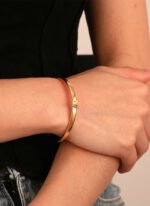 Wholesale European-style minimalist butterfly cuff bracelet featuring a 14k gold plated copper design from junejewelry.com