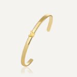 Wholesale European-style minimalist butterfly cuff bracelet featuring a 14k gold plated copper design from junejewelry.com