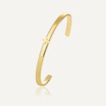 Wholesale European-style minimalist cross cuff bracelet featuring a 14k gold plated copper design from junejewelry.com