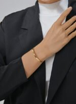 Wholesale European-style minimalist cuff bracelet featuring a 14k gold plated copper design from junejewelry.com