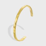 Wholesale European-style minimalist cuff bracelet featuring a 14k gold plated copper design from junejewelry.com