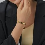 Wholesale European-style hammered cuff bracelet featuring a 14k gold plated copper design from junejewelry.com