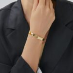 Wholesale European-style hammered cuff bracelet featuring a 14k gold plated copper design from junejewelry.com
