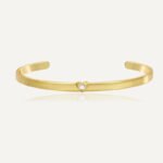 Wholesale Zircon Heart Cuff Bracelet featuring a micro‑pavé zircon heart on a 14K gold‑plated copper open cuff from junejewelry.com—factory price, free shipping.