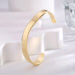 Wholesale Irregular Gold‑Plated Copper Cuff Bracelet featuring a free‑form silhouette with high‑polish 14K gold plating over copper—factory price, free shipping.