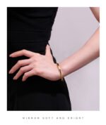 Wholesale European-style minimalist wishes cuff bracelet featuring a 14k gold plated copper design from junejewelry.com