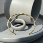 Wholesale European-style irregular lava cuff bracelet featuring a 14k gold plated copper design from junejewelry.com