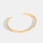 Wholesale European-style minimalist open cuff bracelet featuring a 14k gold plated copper design from junejewelry.com