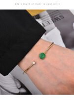 Wholesale European-style minimalist gemstone cuff bracelet featuring a 14k gold plated copper design from junejewelry.com