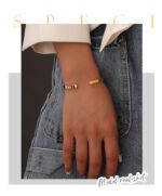 Wholesale European-style minimalist arrow cuff bracelet featuring a 14k gold plated copper design from junejewelry.com