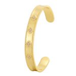 Four Leaf Clover Cuff Bracelet featuring a hollow shamrock motif with micro‑pavé zircon stones on 14K gold‑plated copper from junejewelry.com—factory price, free shipping.