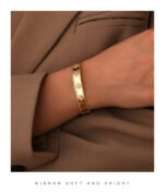 Four Leaf Clover Cuff Bracelet featuring a hollow shamrock motif with micro‑pavé zircon stones on 14K gold‑plated copper from junejewelry.com—factory price, free shipping.