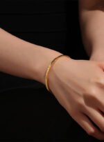 Wholesale European-style minimalist patterned cuff bracelet featuring a 14k gold plated copper design from junejewelry.com