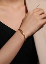 Wholesale European-style minimalist patterned cuff bracelet featuring a 14k gold plated copper design from junejewelry.com