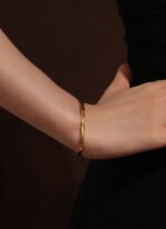Wholesale European-style minimalist patterned cuff bracelet featuring a 14k gold plated copper design from junejewelry.com