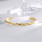 Wholesale European-style minimalist patterned cuff bracelet featuring a 14k gold plated copper design from junejewelry.com