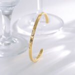 Wholesale European-style minimalist patterned cuff bracelet featuring a 14k gold plated copper design from junejewelry.com