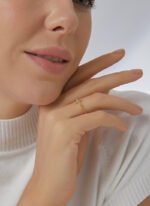 Wholesale Cross Zircon Ring with 18K gold or platinum plating, minimalist design with sparkling stones — trendy wholesale ring from junejewelry.com.