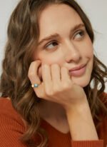 Wholesale geometric opal CZ ring featuring an 18k gold plated copper design from junejewelry.com