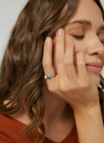 Wholesale geometric opal CZ ring featuring an 18k gold plated copper design from junejewelry.com