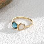 Wholesale geometric opal CZ ring featuring an 18k gold plated copper design from junejewelry.com