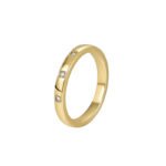 Wholesale 3 stone ring featuring a classic design with 18K gold plated copper and CZ stones from junejewelry.com