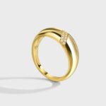 Wholesale Croissant Dome Ring in 18K gold-plated brass with glossy wide-band design, available in sizes 6 to 9 from junejewelry.com.
