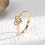 Wholesale heart shape ring for women with carved floral design and 18K gold plating – romantic wedding style jewelry from junejewelry.com.