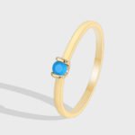 Wholesale turquoise stack ring with single blue stone on 18K gold-plated copper band – minimalist INS style from junejewelry.com.