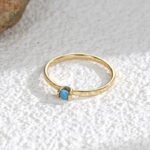 Wholesale turquoise stack ring with single blue stone on 18K gold-plated copper band – minimalist INS style from junejewelry.com.
