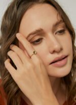 Wholesale zircon stacking ring with half pavé setting on round 18K gold-plated copper band from junejewelry.com – dainty and stackable design.