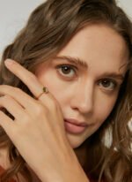 Wholesale zircon stacking ring with half pavé setting on round 18K gold-plated copper band from junejewelry.com – dainty and stackable design.