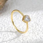 Gold Heart Zircon Ring featuring a heart‑shaped zircon on a 18K gold‑plated copper band from junejewelry.com—factory price, free shipping.