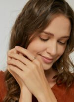 Court-Style Emerald Zircon Ring featuring an emerald-cut zircon and pavé zircon accents on a 18K gold-plated copper band from junejewelry.com—factory price, free shipping.