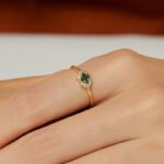 Court-Style Emerald Zircon Ring featuring an emerald-cut zircon and pavé zircon accents on a 18K gold-plated copper band from junejewelry.com—factory price, free shipping.