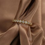 Minimal Gold Pave Ring featuring an 18K gold‑plated copper band fully covered in micro‑pavé white zircon from junejewelry.com—factory-direct price, free shipping.