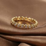 Minimal Gold Pave Ring featuring an 18K gold‑plated copper band fully covered in micro‑pavé white zircon from junejewelry.com—factory-direct price, free shipping.