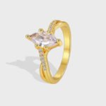 Wholesale marquise CZ ring featuring an elegant design with 18k gold plated copper and a marquise-cut CZ stone from junejewelry.com