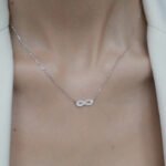 Wholesale Infinity Silver Set, 925 sterling silver, inlaid with zircons, includes necklace and bracelet, INS style niche high-end design, from junejewelry.com.