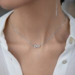 Wholesale Infinity Silver Set, 925 sterling silver, inlaid with zircons, includes necklace and bracelet, INS style niche high-end design, from junejewelry.com.