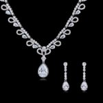 Wholesale teardrop cubic zirconia wedding jewelry set with platinum-plated copper necklace and matching earrings, featuring a large teardrop main stone, from JuneJewelry.com.
