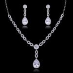 Wholesale bridal necklace and earrings set with platinum plating and zircon stones from JuneJewelry.com – perfect for bulk fashion jewelry orders.