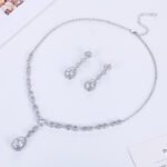 Wholesale bridal necklace and earrings set with platinum plating and zircon stones from JuneJewelry.com – perfect for bulk fashion jewelry orders.