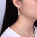Wholesale bridal necklace and earrings set with platinum plating and zircon stones from JuneJewelry.com – perfect for bulk fashion jewelry orders.