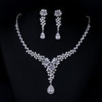 Wholesale CZ floral drop necklace and matching dangle earrings set, platinum plated copper bridal jewelry from JuneJewelry.com.