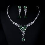 Wholesale CZ floral drop necklace and matching dangle earrings set, platinum plated copper bridal jewelry from JuneJewelry.com.