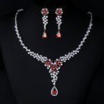 Wholesale CZ floral drop necklace and matching dangle earrings set, platinum plated copper bridal jewelry from JuneJewelry.com.