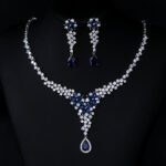 Wholesale CZ floral drop necklace and matching dangle earrings set, platinum plated copper bridal jewelry from JuneJewelry.com.