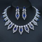 Wholesale colorful cubic zirconia wedding jewelry set with platinum-plated copper necklace and matching earrings in green, red, and blue, from JuneJewelry.com.