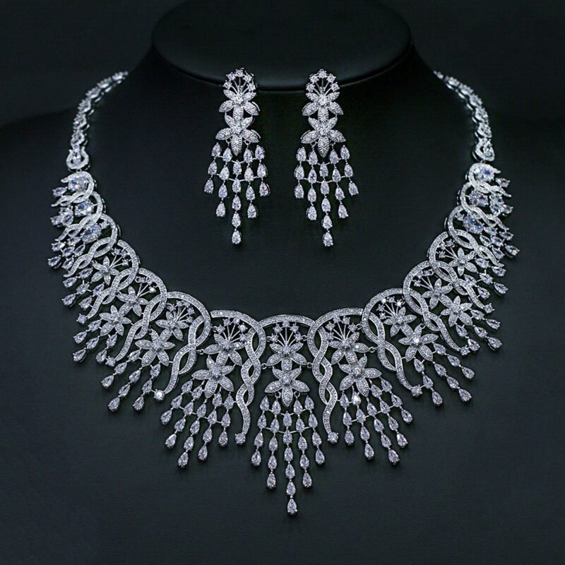 Wholesale Cubic Zirconia Wedding Jewelry Set with floral necklace and drop tassel earrings from JuneJewelry.com – elegant sterling silver bridal jewelry style for bulk orders.